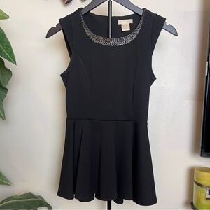 Pretty Good Black Peplum Top with Silver Accents